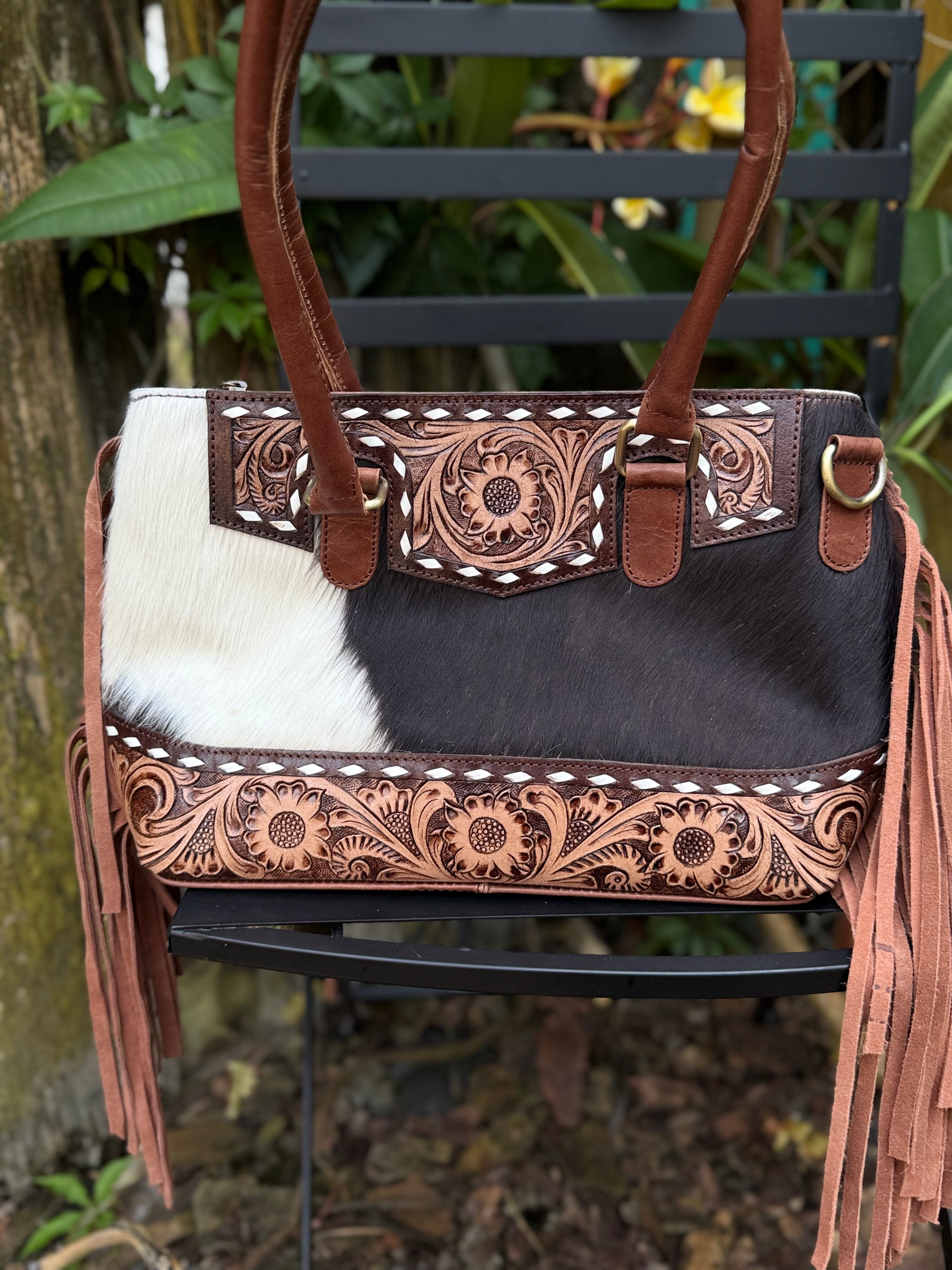 The Frontier Fringe Carryall | Cowhide, tooling, fringe, and function. Includes concealed carry pocket and two ways to wear