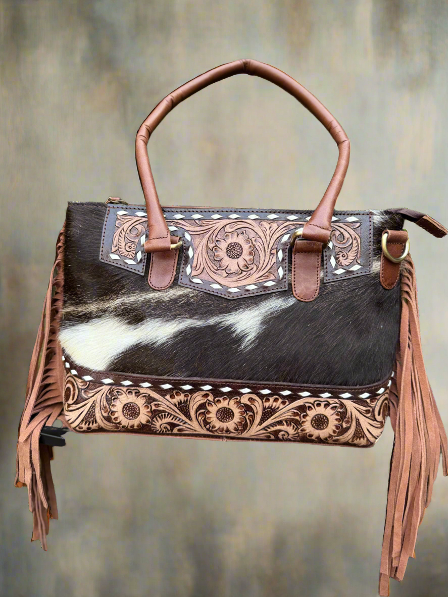 The Frontier Fringe Carryall | Cowhide, tooling, fringe, and function. Includes concealed carry pocket and two ways to wear