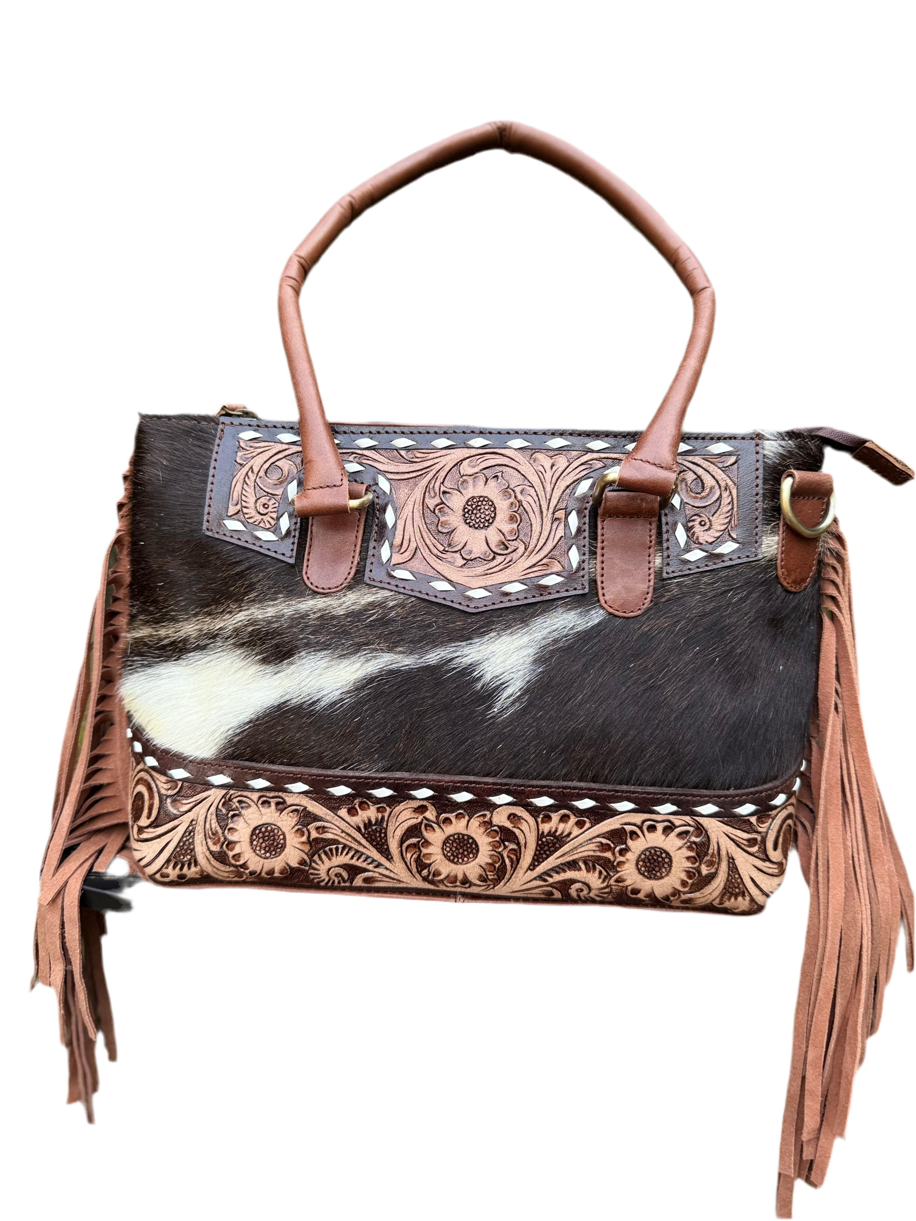 The Frontier Fringe Carryall | Cowhide, tooling, fringe, and function. Includes concealed carry pocket and two ways to wear