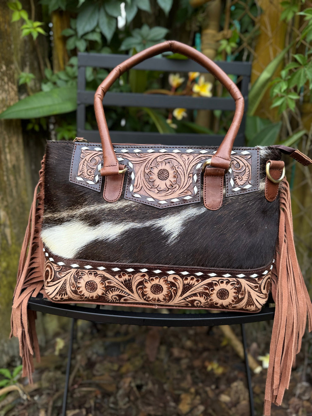 The Frontier Fringe Carryall | Cowhide, tooling, fringe, and function. Includes concealed carry pocket and two ways to wear