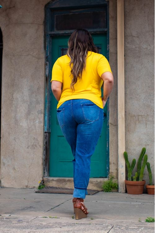 MID WASH DISTRESSED BOYFRIEND JEANS